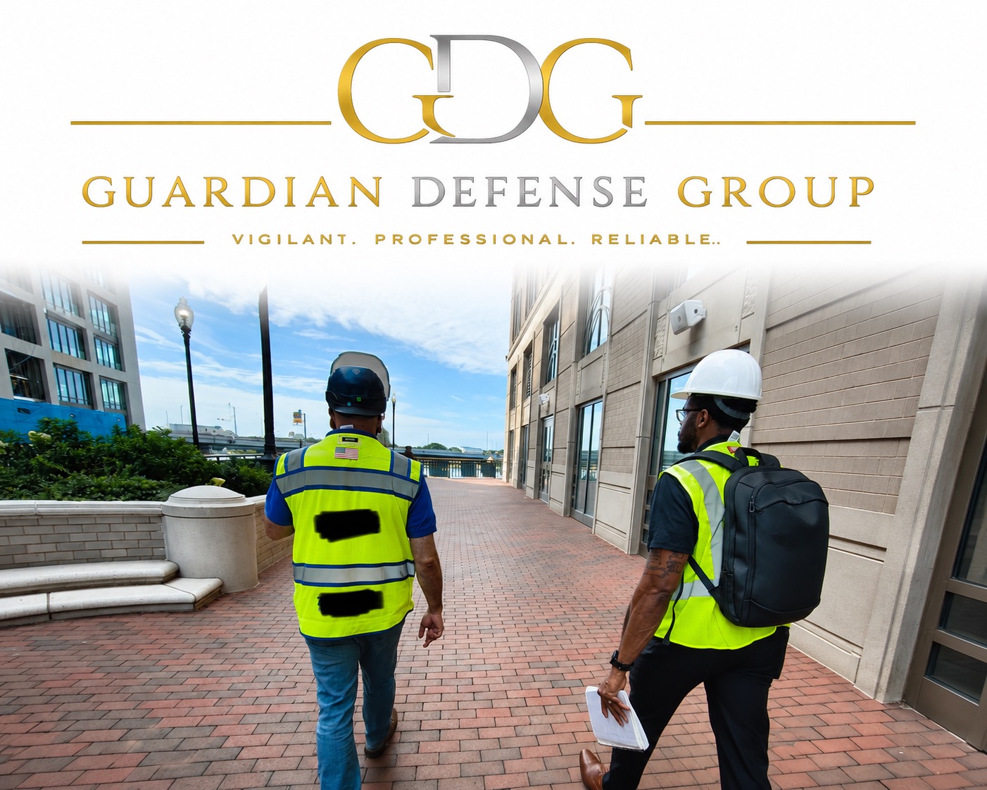 Guardian Defense Group officers in high-visibility vests on a site patrol